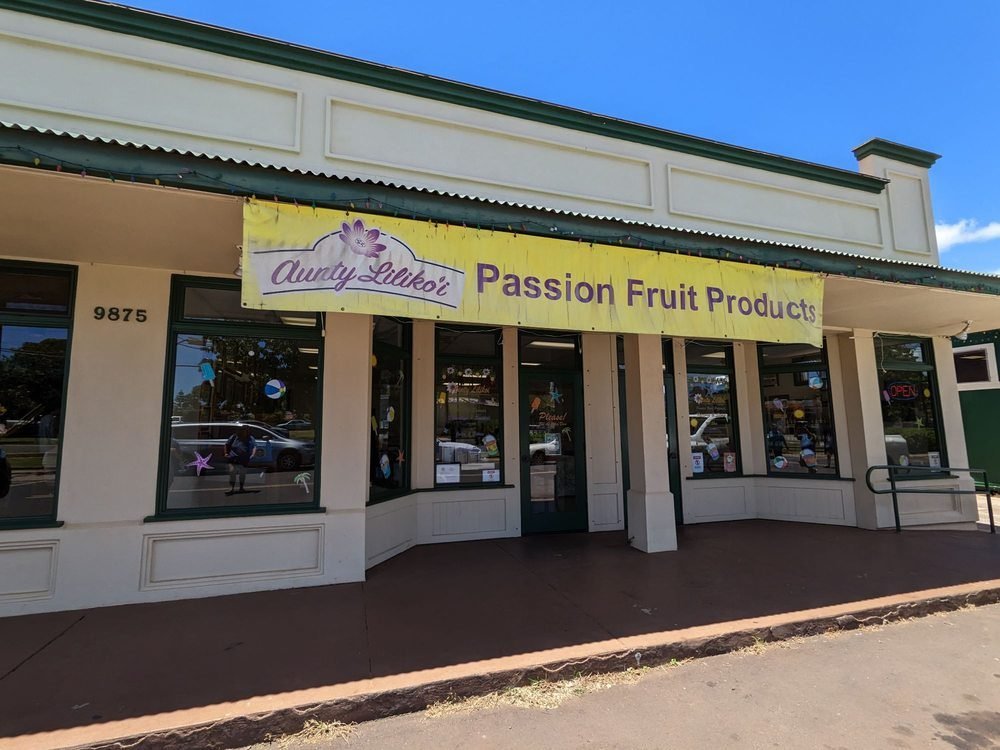 The Aunty Lilikoʻi storefront in Historic Waimea Town with its yellow Passion Fruit Products banner